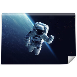 Fototapeta winylowa zmywalna Astronauta w przestrzeni kosmicznej
