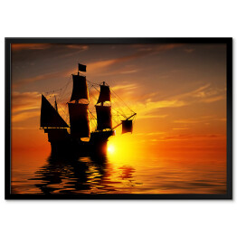 Stary piracki statek na tle złocistego zachodu słońca