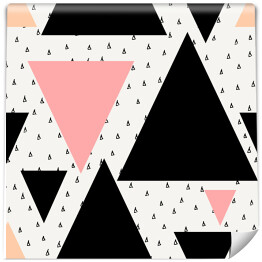 Czarne i różowe trójkąty różnej wielkości na kropkowanym tle
