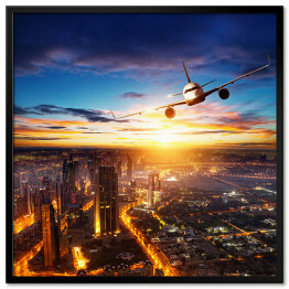 Samolot latający nad nowoczesnym miastem