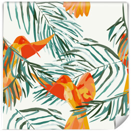 Żółto pomarańczowe rajskie ptaki na tropikalnych liściach