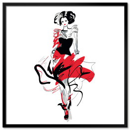 Modelka w czerwono czarnej sukni na wybiegu