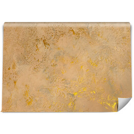 Ściana w kolorze cielistym ze złotymi lśniącymi zdobieniami