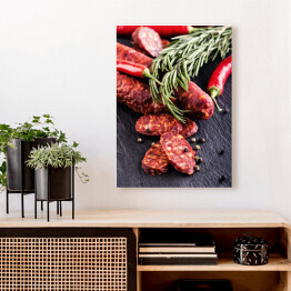 Obraz na płótnie Kiełbasa chorizo z ziołami, czosnkiem, papryką i papryką chili