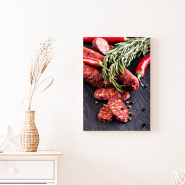 Obraz na płótnie Kiełbasa chorizo z ziołami, czosnkiem, papryką i papryką chili