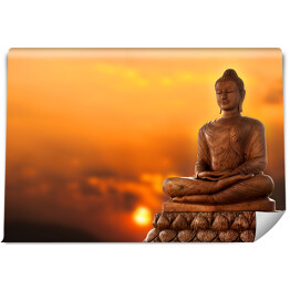 Fototapeta winylowa zmywalna Budda na tle zachodu słońca