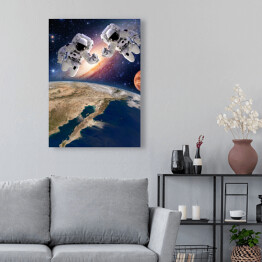 Obraz na płótnie Dwóch astronautów na tle Ziemii i Księżyca