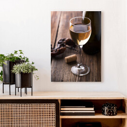 Obraz na płótnie Kieliszek wina, butelki i korkociąg