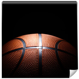 Fototapeta Miejscowo oświetlona piłka do koszykówki