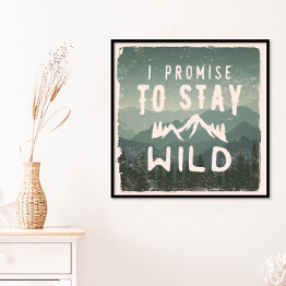 Plakat w ramie "Obiecuję, że pozostanę dziki" - cytat na tle gór