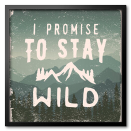 Obraz w ramie "Obiecuję, że pozostanę dziki" - cytat na tle gór