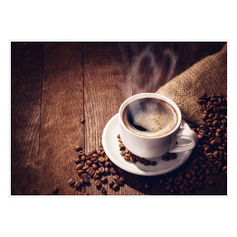 Plakat samoprzylepny Filiżanka i ziarna kawy na drewnianym tle