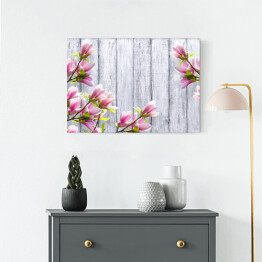 Obraz na płótnie Magnolia kwitnąca na tle drewnianych desek