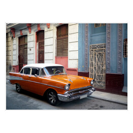 Plakat Pomarańczowy amerykański samochod na przedmieściach Hawany