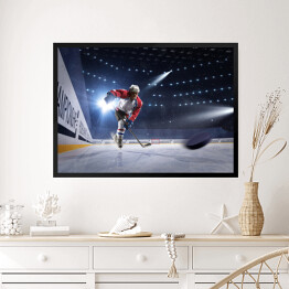 Obraz w ramie Hokeista na lodowej arenie