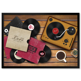 Plakat w ramie Gramofon i rozrzucone płyty winylowe na drewnianym tle