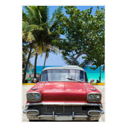 Plakat Stary czerwony samochód na piaszczystej plaży - Hawana, Kuba