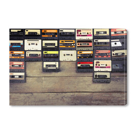 Obraz na płótnie Audio kasety na drewnianym stole