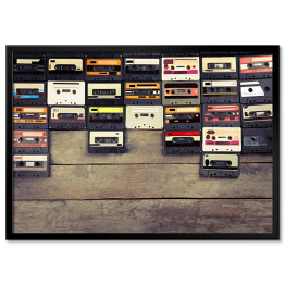 Plakat w ramie Audio kasety na drewnianym stole