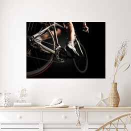 Plakat Młody człowiek na rowerze