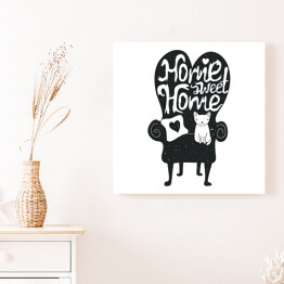Obraz na płótnie Nie ma to jak w domu - ilustracja z białym kota na czarnej kanapie