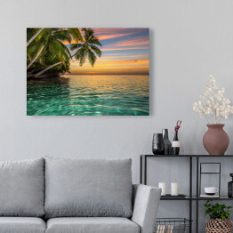 Obraz na płótnie Zachód słońca ze wspaniałymi kolorami na tropikalnej wyspie 
