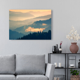 Obraz na płótnie Ciemny las na tle gór w pastelowych barwach