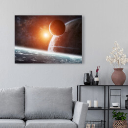 Obraz na płótnie Wschód słońca nad grupą planet w przestrzeni kosmicznej