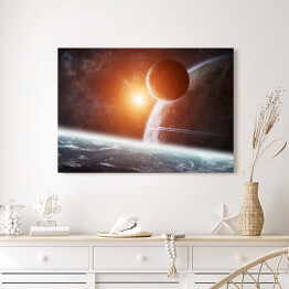 Obraz na płótnie Wschód słońca nad grupą planet w przestrzeni kosmicznej