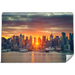 Fototapeta Chmurny wschód słońca nad Manhattanem, Nowy Jork