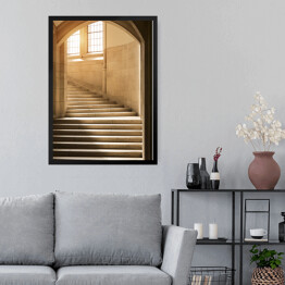 Obraz w ramie Światło świecące przez okno na kamienne schody 