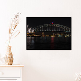 Plakat w ramie Sydney Opera House i Harbour Bridge w nocy