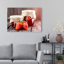 Obraz na płótnie Dżem truskawkowy na drewnianym stole