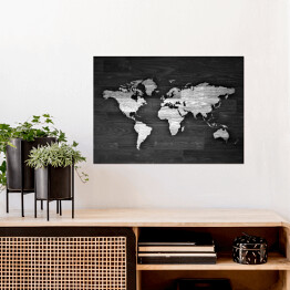 Biało czarna mapa świata na drewnie