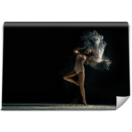 Fototapeta Kobieta tańcząca wśród pyłu