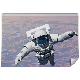 Astronauta ponad chmurami