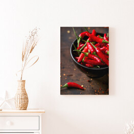 Obraz na płótnie Wysuszone papryczki chilli w ciemnej misce