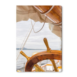 Obraz na płótnie Drewniany koło na dużej żaglówce przy morzem