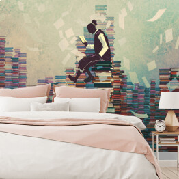 Fototapeta winylowa zmywalna Człowiek siedzący na stosie książek