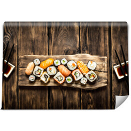 Fototapeta Sushi i rolki - owoce morza z sosem sojowym