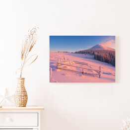 Obraz na płótnie Zimowy świt w górskiej wiosce