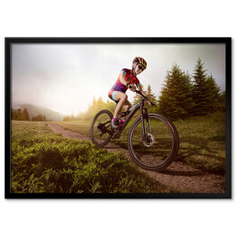 Plakat w ramie Jazda rowerem na tle lasu