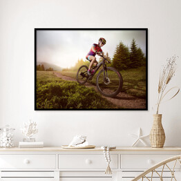 Plakat w ramie Jazda rowerem na tle lasu