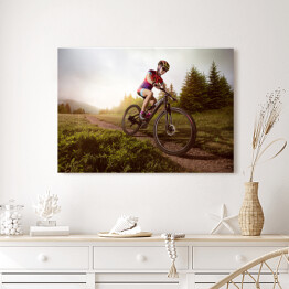 Obraz na płótnie Jazda rowerem na tle lasu