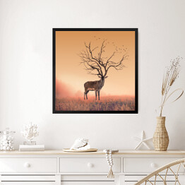 Obraz w ramie Sylwetka jelenia z porożem imitującym koronę drzewa