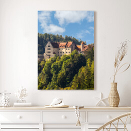 Obraz na płótnie Zamek Rabenstein na tle wzgórza porośniętego drzewami