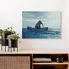 Obraz na płótnie Słoń w łodzi na morzu