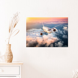 Plakat Samolot nad chmurami na kolorowym niebie