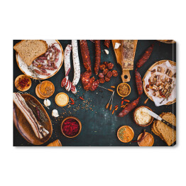 Obraz na płótnie Mięso z sosem musztardowym na rustykalnym ciemnym stole