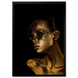Obraz klasyczny Młoda kobieta w czarno złotym artystycznym makijażu glamour
